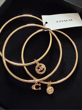 Coach Gold-Tone Bangle Bracelet Set with Signature Charms